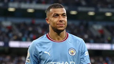 A 25-year-old Moroccan midfielder in a Manchester City jersey, with a confident expression, standing in front of a...