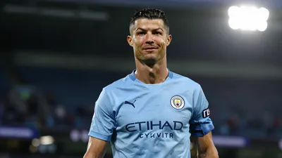 A 30-year-old Spain captain in a Manchester City kit, with a determined look on his face, as he walks off the pitch after...
